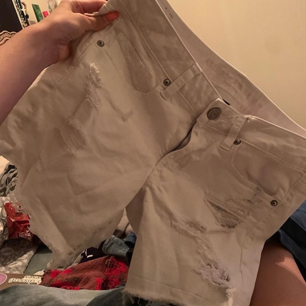 White shorts with rips